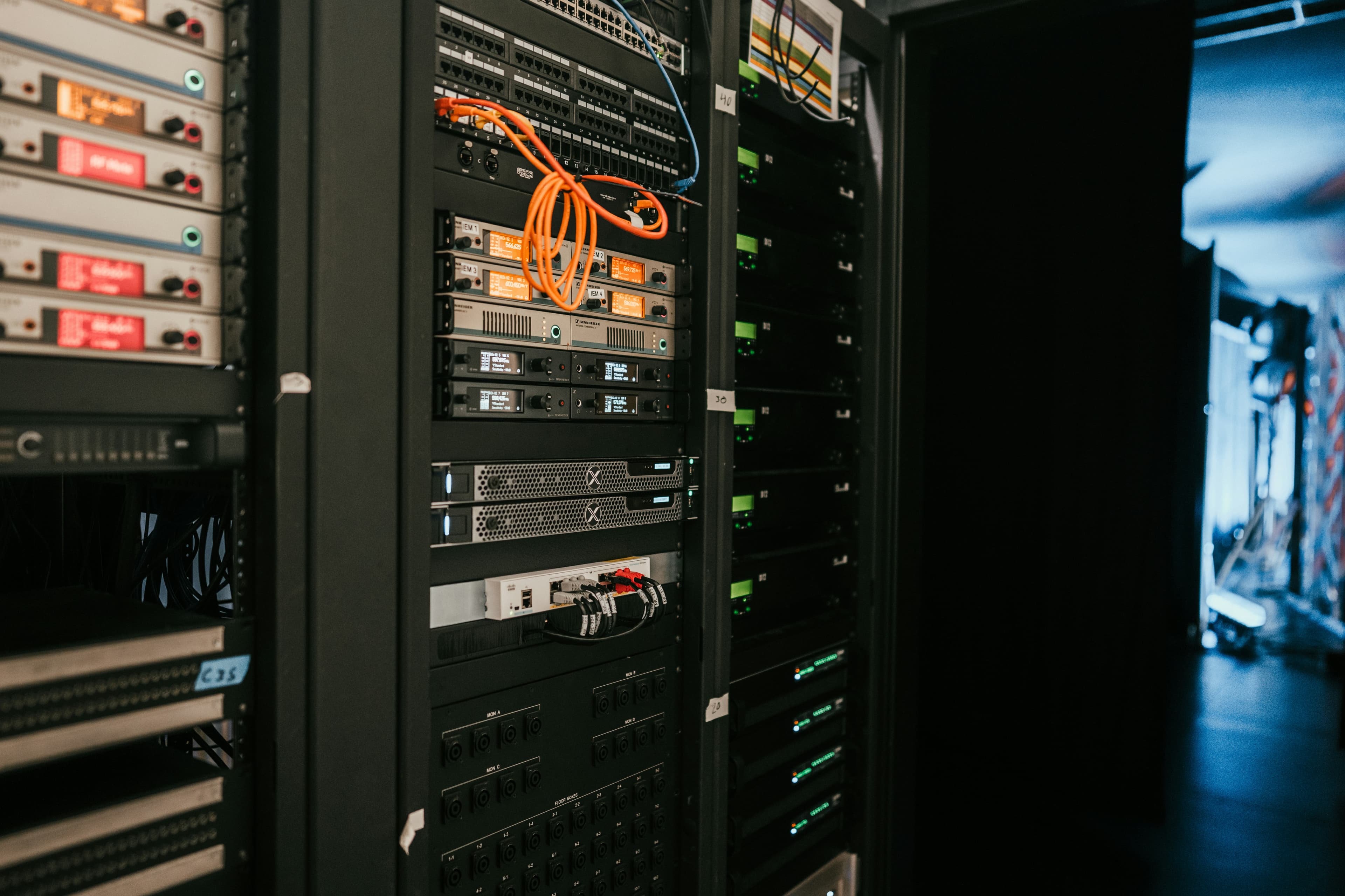 Server racks in a data center, representing database reliability and recovery.